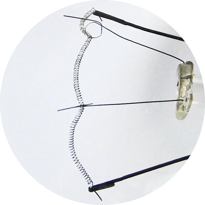 The Filament In An Incandescent Light Bulb Is Made - Earrings (662x662), Png Download