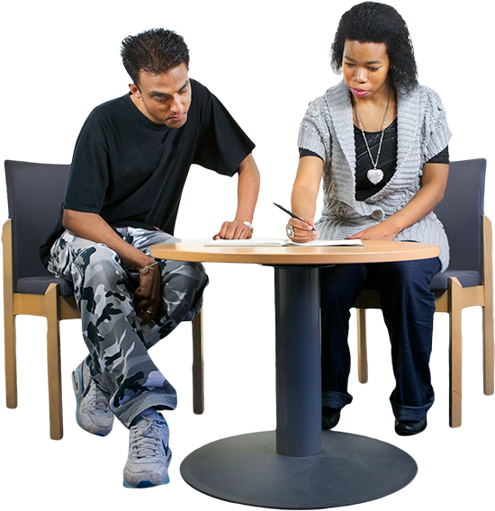 Two People Sitting At A Desk Going Through An Ndis - Kitchen & Dining Room Table (600x600), Png Download