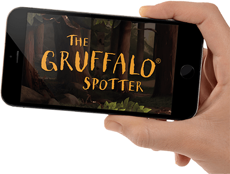 Close Up Of Hand Holding Mobile Phone With Gruffalo - Gruffalo By Julia Donaldson (451x341), Png Download