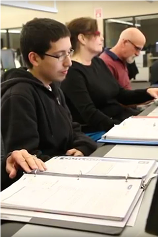 Three Students Seated Togther In Classroom With Notes - Student (720x480), Png Download